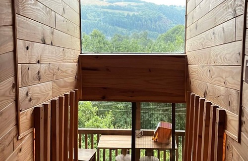 Villefranche-de-Panat Ski Chalet | Chalet perched between river and lake