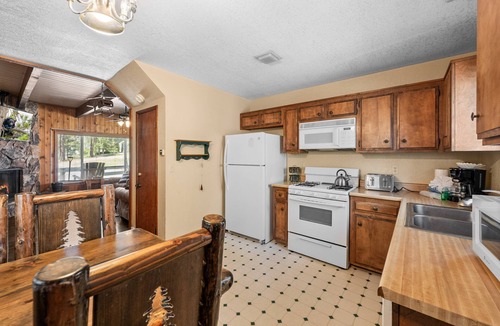 The Village House | Village Hideaway - Walk to Village & Lake, Fireplace, Deck