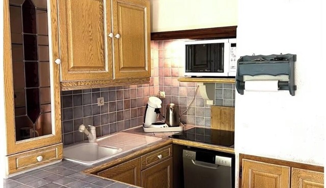 34-square-meter duplex apartment; private parking reserved for the building; pets allowed