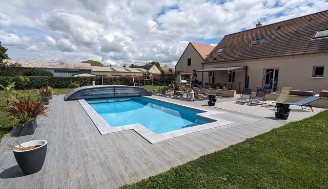 Family Retreat with Heated Pool, Garden, and Kids' Play Area