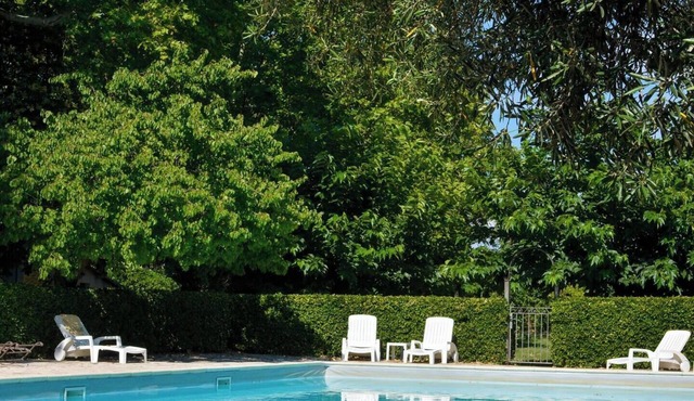 Magnificent apartment in 18th century Priory, with swimming pool and lush grounds